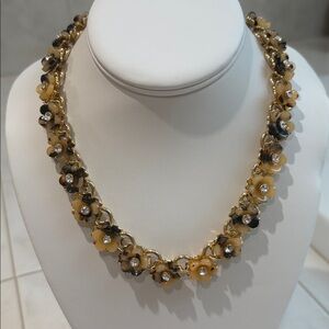 Ann Taylor Floral Tortoiseshell Necklace with Rhinestone Center Accent. EUC